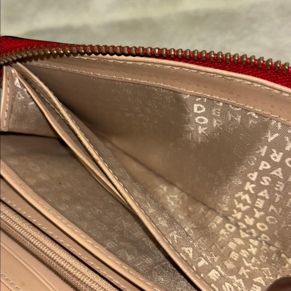 Kate Spade Red Pebbled Leather Zip Around Wallet with Logo Plate